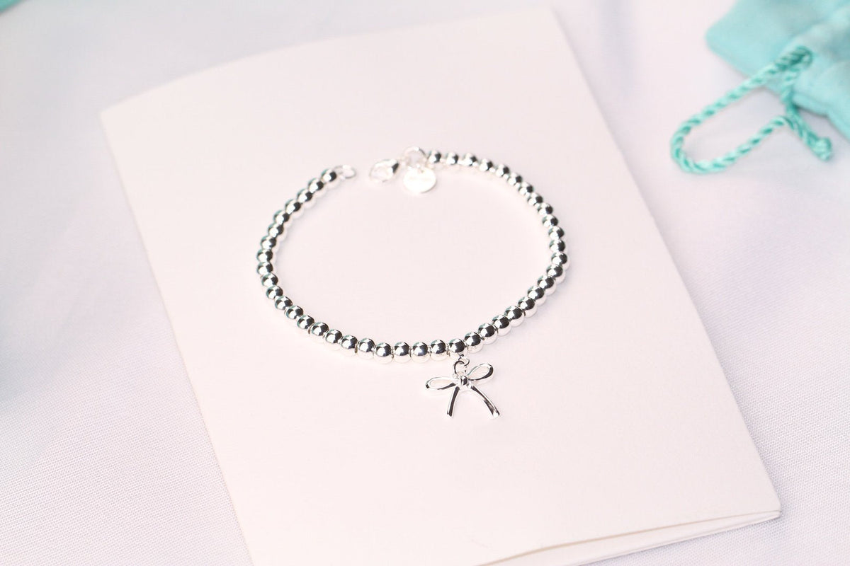 [Clover Jewelry]STERLING SILVER BOW BEAD BRACELET